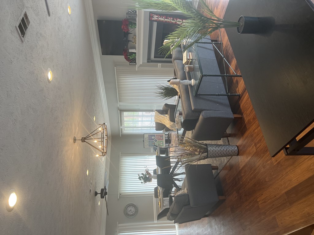 a view from above of a living room and a dining room table